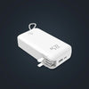Kombo 3 in 1 Power Bank 20,000mAh with foldable AC plug, 22.5W fast charging, and dual built-in charging cables.
